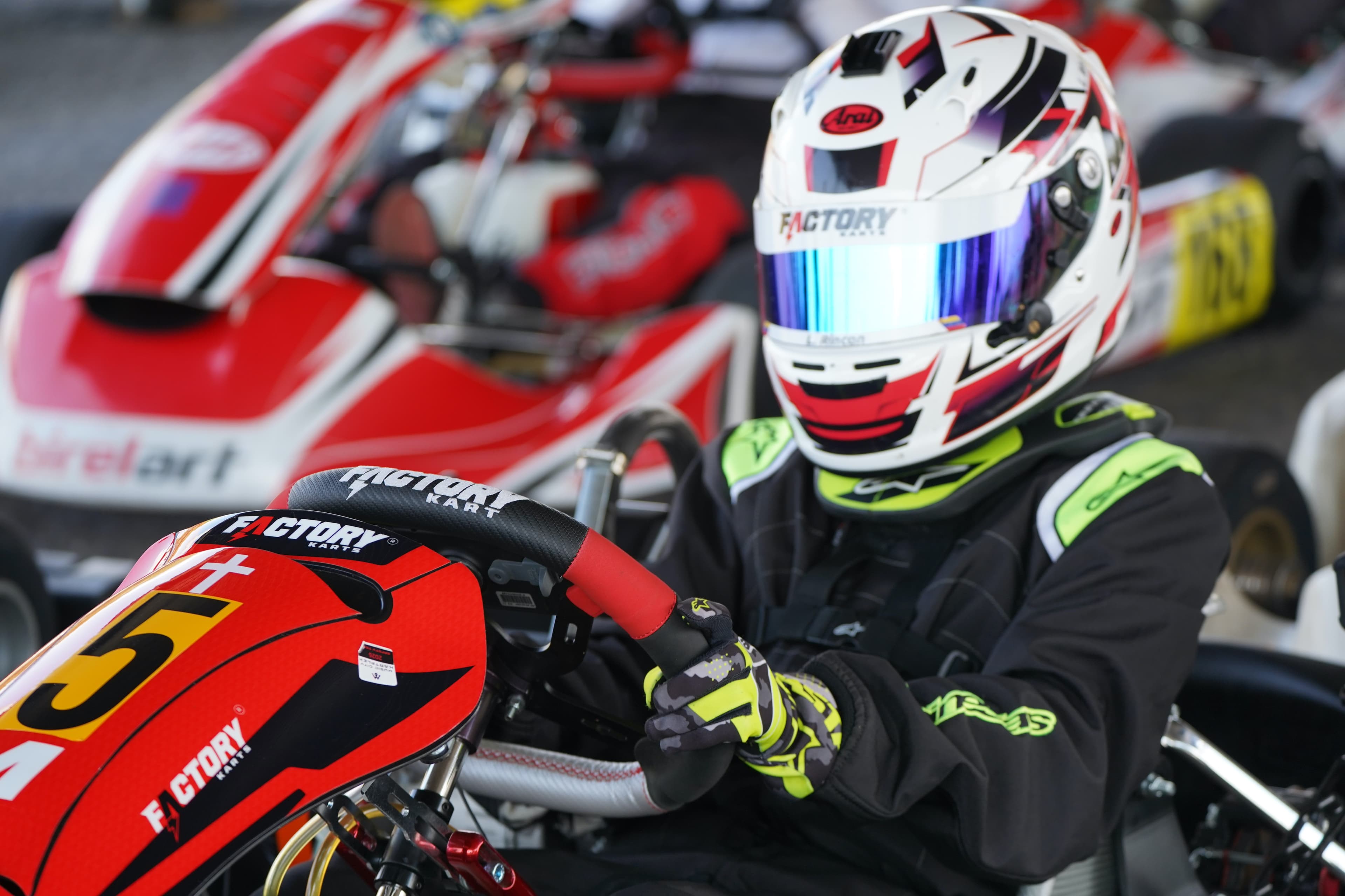 Karts lined up on the grid before a Rhythm and Race round